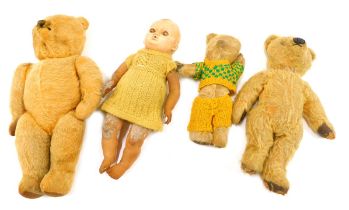 Two early to mid 20thC Teddy bears, another similar, and an early plastic and rubber doll (AF).