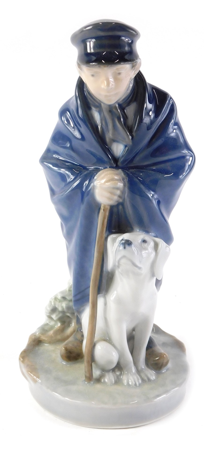A Royal Copenhagen porcelain figure of a shepherd with dog, numbered 782 by Christian Thomsen, 19cm