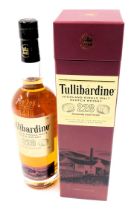 A bottle of Tullibardine 228 Highland Single Malt Scotch whisky, boxed.