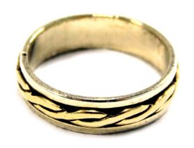 A 9ct gold wedding band, of bicolour design with outer white gold and central crossover yellow gold