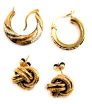 Four earrings, comprising a pair of 9ct gold knot earrings, a bicolour hoop earring, yellow metal st