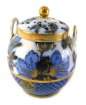 A late 19thC Wedgwood blue printed two handled potpourri jar and cover, decorated with flowers withi