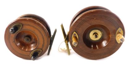 A mahogany and brass fishing reel with bone handles, 11.5cm diameter, and a smaller similar example.