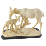 After A Soulier. Figure group of deer and faun, on a rectangular base, resin, 34cm wide.