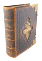 A Scott and Henry Illustrated National Family Bible, oak binding with gilt metal mounts.