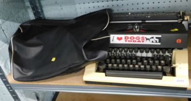 An Olympia manual typewriter.