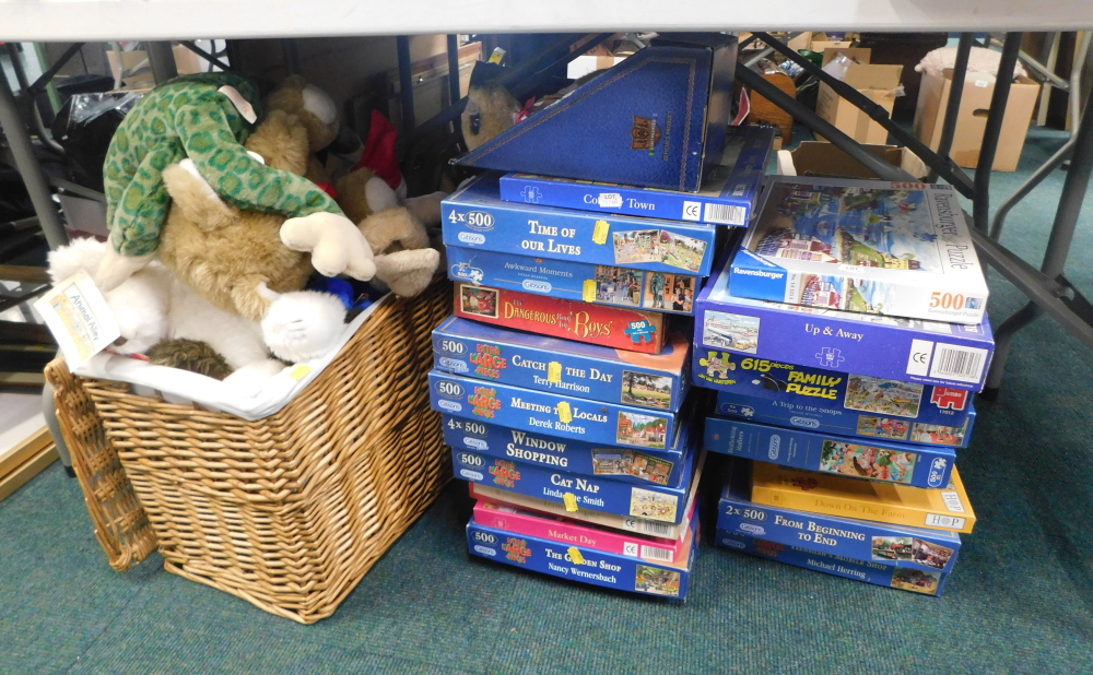 Wicker basket of soft toy bears, various jigsaw puzzles.