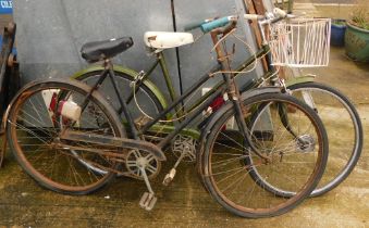Two Raleigh vintage bicycles.
