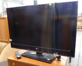 An LG 31" television, 32LK45OU-ZB, with lead and remote.