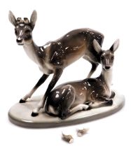 A Goldscheider Art Deco figure of two deer, model number 4760/49/6, artist initial F, 29cm high, 37c