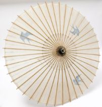 An early 20thC Chinese bamboo and fabric parasol, decorated with swallows, 84cm high.