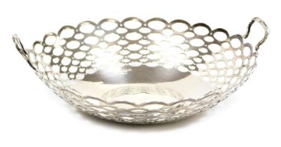 An Edward VII silver twin handled basket, with repeating pierced oval decoration, A&J Zimmerman Ltd,
