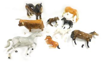 A group of Beswick figures, including a Shire horse, Highland bull, dapple grey horse and matt black