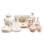 A group of Aynsley Cottage Garden pattern porcelain, including a ginger jar and cover, three vases,