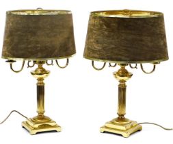 A pair of Adam style brass twin branch table lamps, with brown suede shades, 62cm high. Buyer Note: