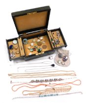 A green material cantilevered jewellery box and contents, including clip on earrings, dress jeweller