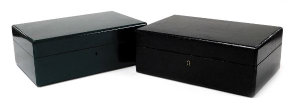 Two cigar humidor boxes, one painted in black, with key, the other in green with a three division in