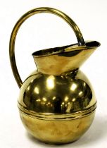 A late 19thC brass jug by Henry Loveridge, in the manner of Christopher Dresser, with a looped handl