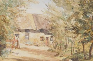 British School (early 20thC). Thatched cottage amongst trees, watercolour, 19cm x 28cm.