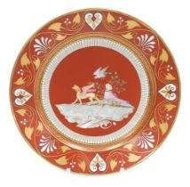 A mid 19thC Sevres Etruscan red ground hard paste porcelain dessert plate, decorated with a griffen