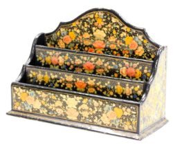 An early 20thC Indian Kashmiri papier mache letter rack, of three tier graduated form, decorated wit