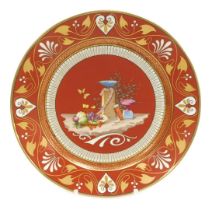 A mid 19thC Sevres Etruscan red ground hard paste porcelain dessert plate, decorated with a still li