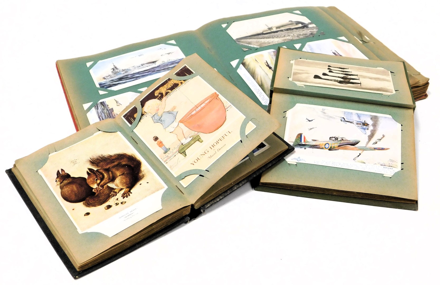 Deltiology, three albums of postcards, containing RAF, Naval and maritime steam locomotives, topogra