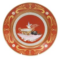 A mid 19thC Sevres Etruscan red ground hard paste porcelain dessert plate, decorated with a dove, fl