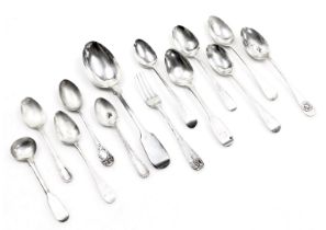 A group of Georgian and later silver teaspoons, dessert spoon, mustard spoon, and a fork, 7.49oz.