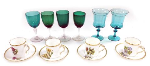 Four Edwardian green and turquoise glass wine glasses, pair of later turquoise wine glasses, and fou