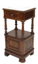 A late 19thC French walnut and marble topped night stand, with a single frieze drawer, raised on tur