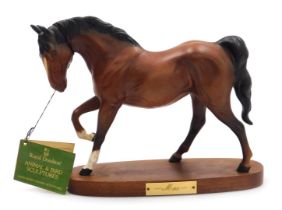 A Royal Doulton pottery equestrian sculpture of Max, brown matt, raised on an oval vase, printed mar