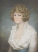 After George Romney (English, 1734-1802). Half length portrait of a lady, pastel, 69cm x 51cm.