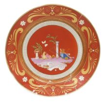 A mid 19thC Sevres Etruscan red ground hard paste porcelain dessert plate, decorated with a griffin,