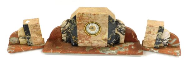 An Art Deco marble clock garniture, circular dial bearing Arabic numerals, German clockwork movement