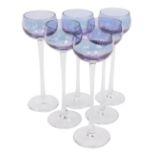 A set of six early 20thC continental long stemmed liqueur glasses, with purple lustre bowls, 16cm hi