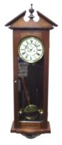 A Gustav Becker wall clock, in a later mahogany case, circular brass dial with chapter ring bearing