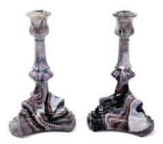 A pair of late 19thC Davidson end of day purple malachite glass candlesticks, with a fluted and face