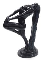 An Austin Productions sculpture of a naked lady, by Klara Server, modelled standing with her left le