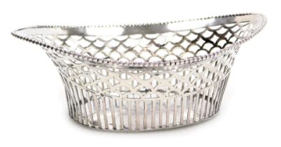 A Dutch silver sweetmeat basket, of oval boat form, with pierced decoration, Dutch import mark, 2.40