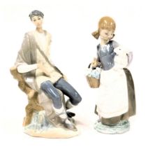 A Lladro porcelain figure of a girl with a basket of onions, and lamb under her arm, 24.5cm high, an