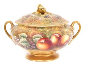 A Royal Worcester porcelain soup tureen and cover, painted by J Skerrett, with fruit, butterflies an