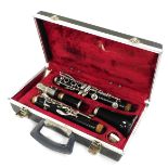 A Boosey & Hawkes Bandhite clarinet, serial number 440381, cased.