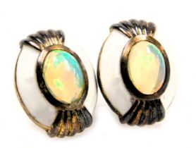 A pair of silver, Ethiopian fire opal and white enamel oval earrings.