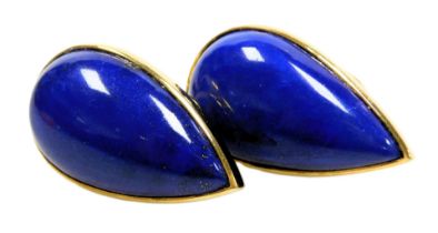 A pair of lapis lazuli earrings, of teardrop form, set in yellow metal, stamped 18k and 750, makers