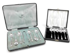A set of six George V silver coffee spoons and sugar tongs, cased, Walker & Hall, Sheffield 1931, an