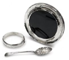 A George III silver berry spoon, the bowl embossed with a leaf and berries, with an engraved handle