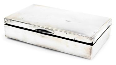 A George VI silver cigarette box, with engine turned decoration, vacant rectangular reserve, Birming