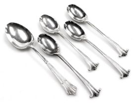 A set of four Edward VII Albany pattern silver teaspoons, Chester 1906, and a further teaspoon, Shef