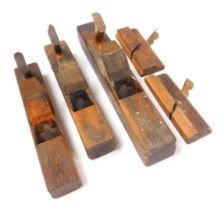 Five vintage carpenter's woodworking planes, comprising three block planes and two moulding planes.